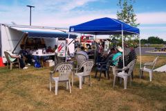 Members relaxing by our trailer at a truck show.